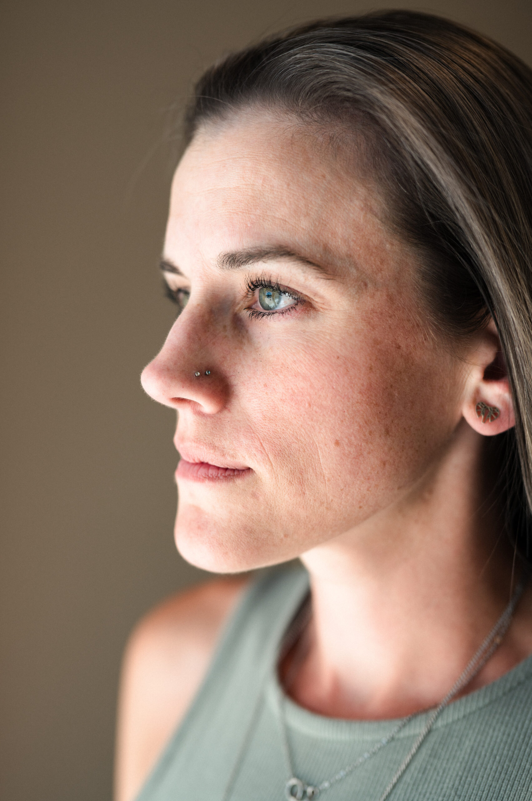 Close-up portrait showing natural skin tone and texture of a woman’s face at Kamloops Skin Solutions.